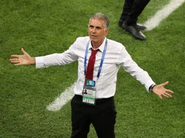 Iran coach Carlos Queiroz appeals for a VAR review during the Portugal match. Reuters