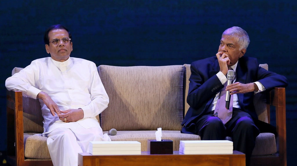 Sri Lanka's Prime Minister Ranil Wickremesinghe (R) with President Maithripala Sirisena at an event in Colombo. — REUTERS