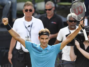 Roger Federer reacts after winning the semi-final match against Nick Kyrgios. AFP