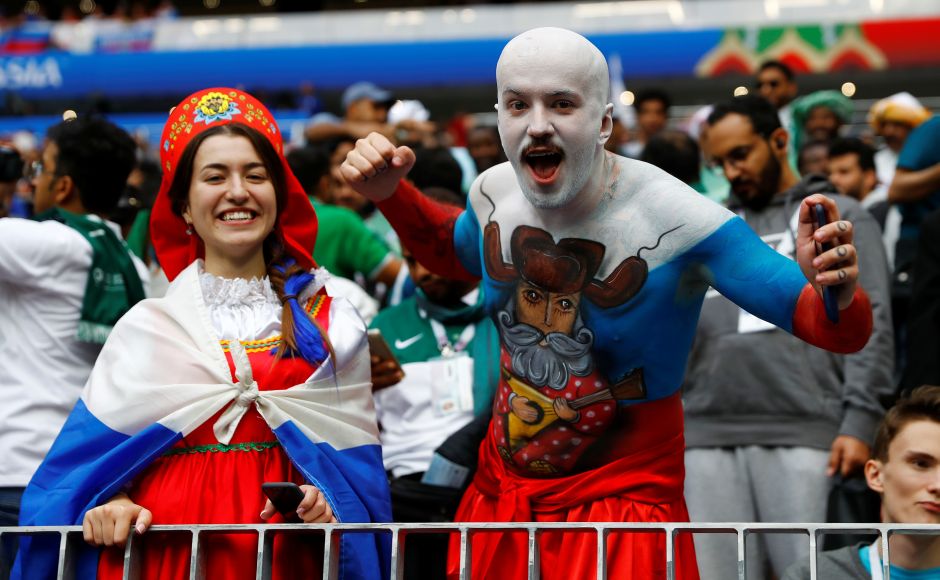 A Russian fan with body paint in Moscow. Reuters A Russian fan with body paint in Moscow. Reuters