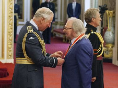 Bee Gees singer Barry Gibb honoured with knighthood by Prince Charles at Buckingham Palace Bee Gees singer Barry Gibb honoured with knighthood by Prince Charles at Buckingham Palace