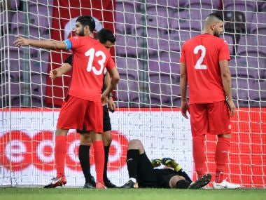Mouez Tunisia's goalkeeper Mouez Hassen (C) lays down next to midfielder Ferjani Sassi (L) and defender Syam Ben Youssef during the friendly football match between Tunisia and Turkey. AFP