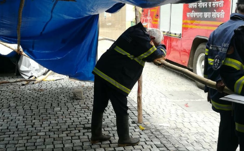 An exhausted fireman who had gone up and was attacked by a heat wave. Image courtesy: Nevin Thomas An exhausted fireman who had gone up and was attacked by a heat wave. Image courtesy: Nevin Thomas