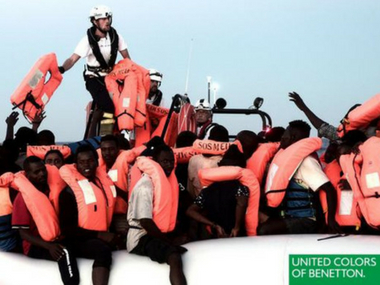 United Colors Benetton slammed by French NGO for featuring photograph of migrants in advertisement United Colors Benetton slammed by French NGO for featuring photograph of migrants in advertisement