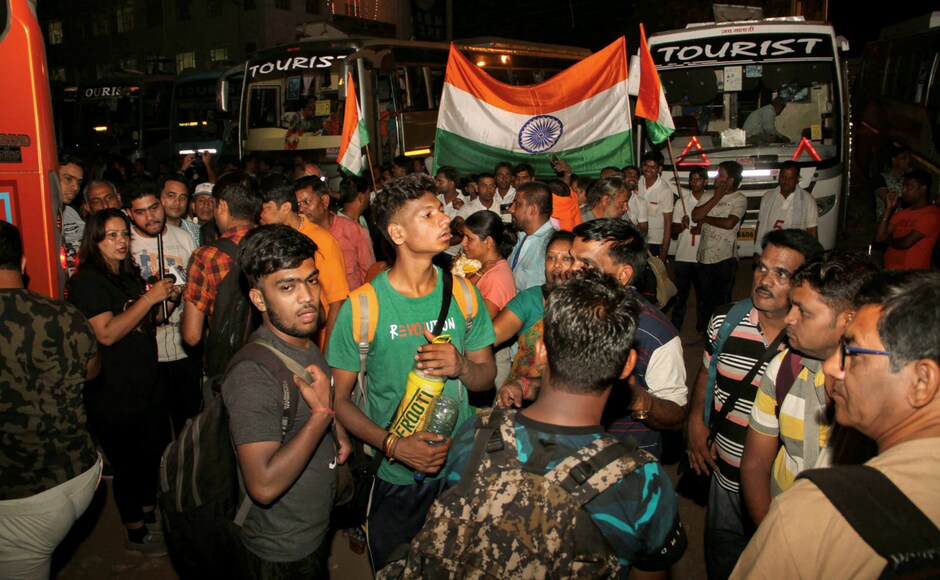 Devotees board buses, as the first batch of pilgrims leaves for Amarnath Yatra, in Jammu on Wednesday. Unperturbed by the looming terror threat, pilgrims said their unflinching faith in Lord Shiva and the security forces had motivated them to undertake the journey to the cave shrine in south Kashmir Himalayas. Chants of Devotees board buses, as the first batch of pilgrims leaves for Amarnath Yatra, in Jammu on Wednesday. Unperturbed by the looming terror threat, pilgrims said their unflinching faith in Lord Shiva and the security forces had motivated them to undertake the journey to the cave shrine in south Kashmir Himalayas. Chants of
