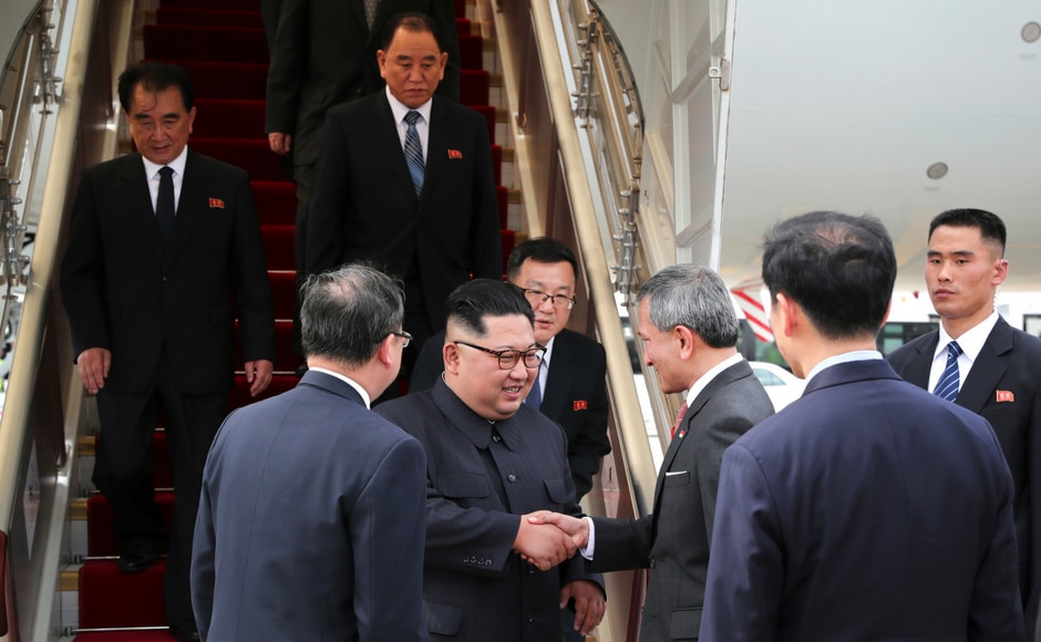 In this photo released by the Ministry of Communications and Information of Singapore, North Korean leader Kim Jong-un, centre left, is greeted by Singapore Minister for Foreign Affairs Vivian Balakrishnan at the Changi International Airport. Kim smiled broadly Sunday evening as he met with Singapore prime minister Lee Hsien Loong. “The entire world is watching the historic summit between (North Korea) and the United States of America, and thanks to your sincere efforts ... we were able to complete the preparations for the historic summit,” Kim told Lee. AP In this photo released by the Ministry of Communications and Information of Singapore, North Korean leader Kim Jong-un, centre left, is greeted by Singapore Minister for Foreign Affairs Vivian Balakrishnan at the Changi International Airport. Kim smiled broadly Sunday evening as he met with Singapore prime minister Lee Hsien Loong. “The entire world is watching the historic summit between (North Korea) and the United States of America, and thanks to your sincere efforts ... we were able to complete the preparations for the historic summit,” Kim told Lee. AP