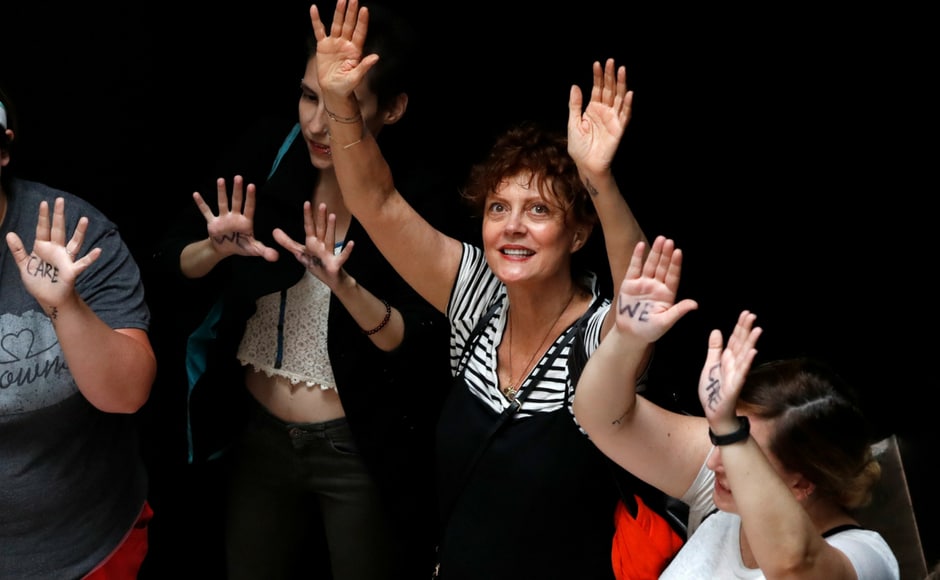 Nearly 600 women, along with actress Susan Sarandon were arrested. They courted their arrest with raised arms. AP Nearly 600 women, along with actress Susan Sarandon were arrested. They courted their arrest with raised arms. AP