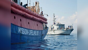 EU leaders hold talks in Brussels to resolve refugee crisis after Italy's refusal to take in migrants