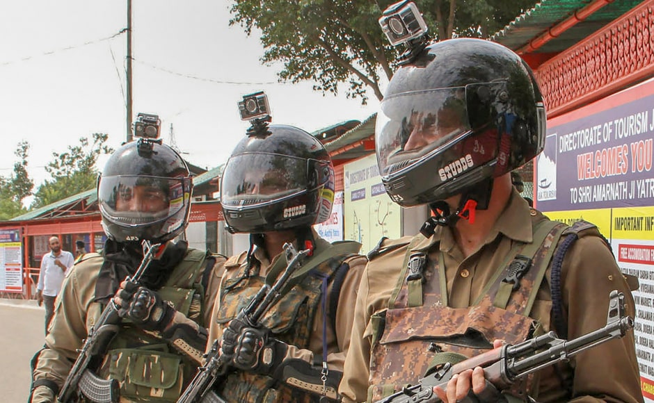 Security personnel, wearing camera-equipped-helmets, guard at Yatri Niwas base camp, ahead of the start of the yatra. The CRPF road-clearing parties will keep sweeping yatra roads against possible improvised explosive device (IEDs) threats to yatra convoys from early morning till late evening. PTI Security personnel, wearing camera-equipped-helmets, guard at Yatri Niwas base camp, ahead of the start of the yatra. The CRPF road-clearing parties will keep sweeping yatra roads against possible improvised explosive device (IEDs) threats to yatra convoys from early morning till late evening. PTI
