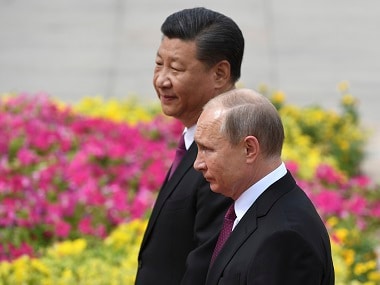 Russian president Vladimir Putin with Chinese president Xi Jinping. AP