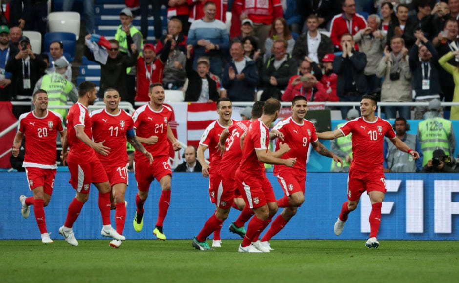 Serbia's Aleksandar Mitrovic celebrates with team mates after scoring their first goal. Reuters Serbia's Aleksandar Mitrovic celebrates with team mates after scoring their first goal. Reuters