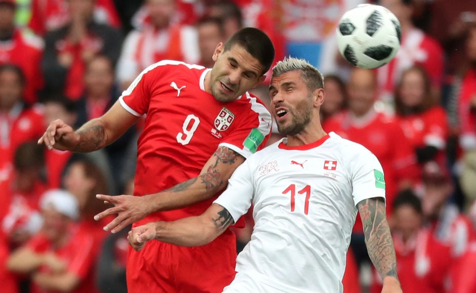Serbia's Aleksandar Mitrovic in action with Switzerland's Valon Behrami. Reuters Serbia's Aleksandar Mitrovic in action with Switzerland's Valon Behrami. Reuters
