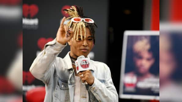 XXXTentacion fans hold candlelight vigil at scene of murder, police hint at the possibility of armed robbery