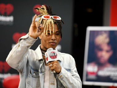 XXXTentacion fans hold candlelight vigil at scene of murder, police hint at the possibility of armed robbery XXXTentacion fans hold candlelight vigil at scene of murder, police hint at the possibility of armed robbery