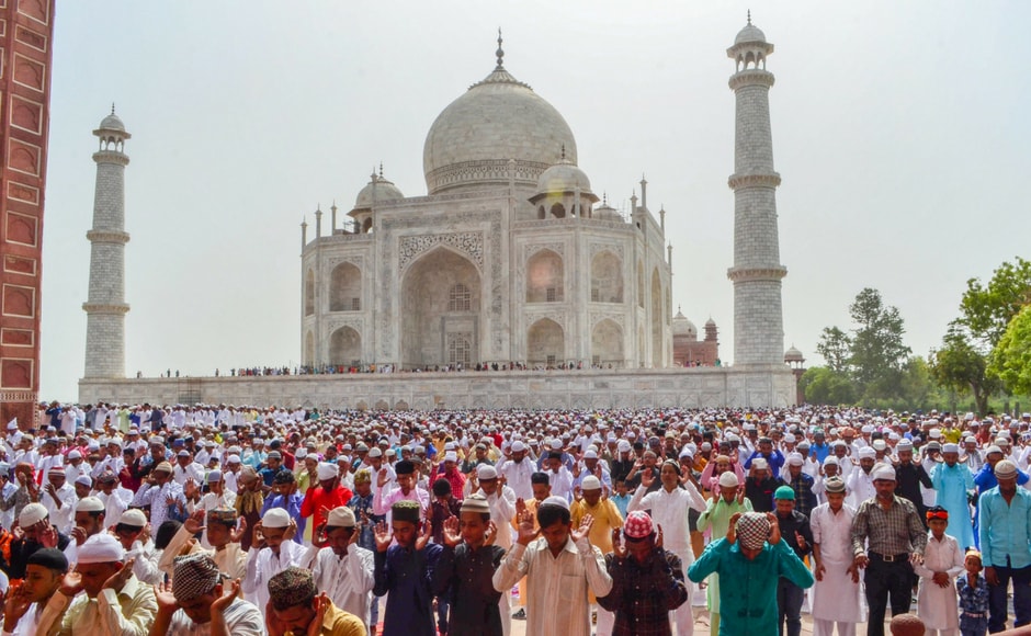 Hudnreds of Muslims gathered to offer prayers at the beautiful Taj Mahal in Agra as well. The crescent of the moon was sighted on the evening of 15 June. PTI Hudnreds of Muslims gathered to offer prayers at the beautiful Taj Mahal in Agra as well. The crescent of the moon was sighted on the evening of 15 June. PTI