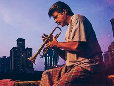 Fanney Khan second poster: Lungi-clad Anil Kapoor plays the trumpet against an urban landscape Fanney Khan second poster: Lungi-clad Anil Kapoor plays the trumpet against an urban landscape