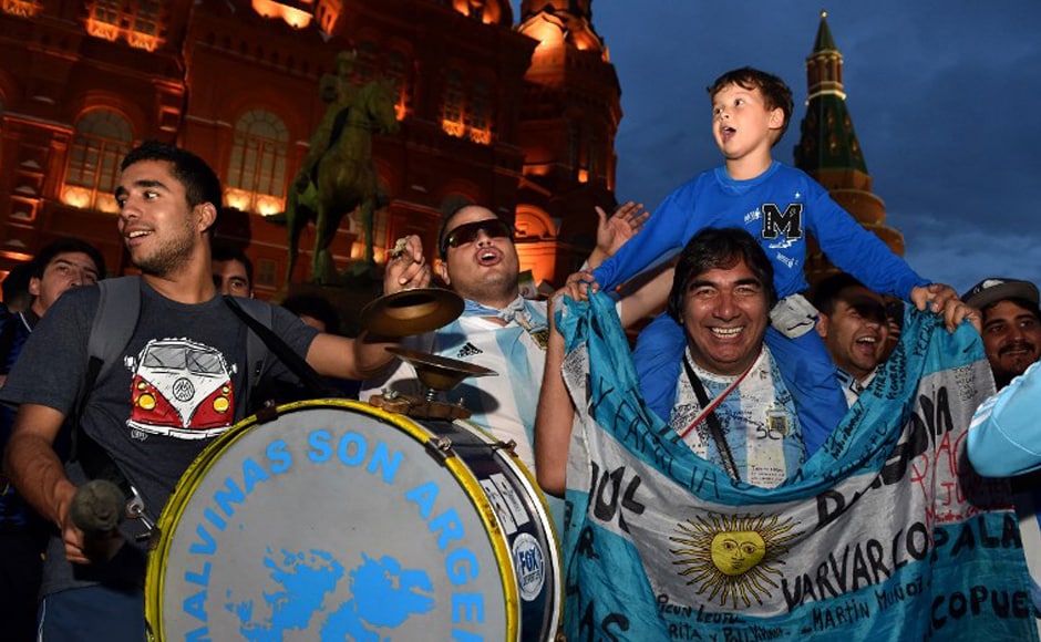 Argentina's national football team fans cheer outside the Kremlin on 11 June, 2018, in Moscow, ahead of the Russia 2018 football World Cup. AFP. Argentina's national football team fans cheer outside the Kremlin on 11 June, 2018, in Moscow, ahead of the Russia 2018 football World Cup. AFP.