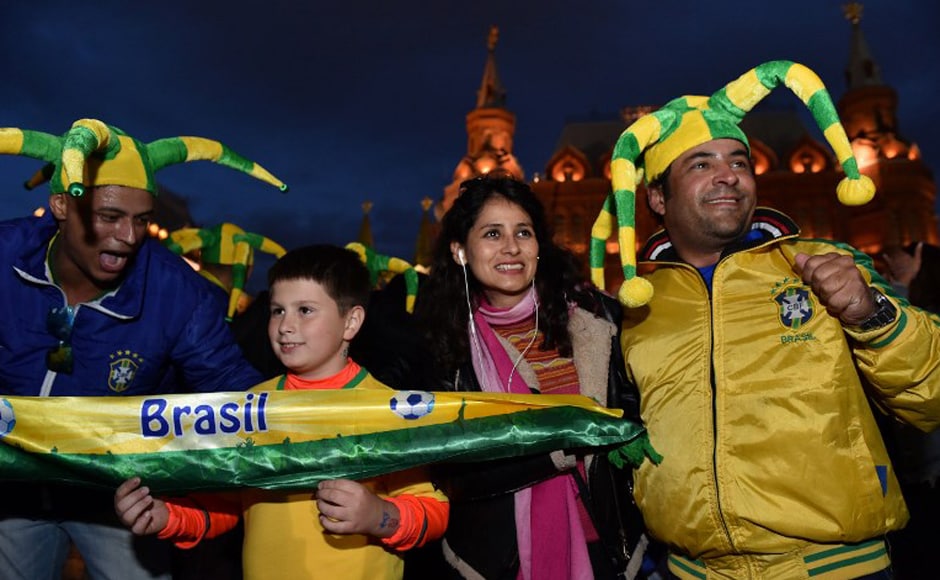 Brazil's national football team fans cheer outside the Kremlin on 11 June, 2018, in Moscow, ahead of the Russia 2018 football World Cup. AFP. Brazil's national football team fans cheer outside the Kremlin on 11 June, 2018, in Moscow, ahead of the Russia 2018 football World Cup. AFP.