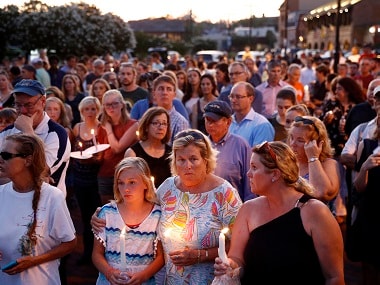   Hundreds gather during a vigil in response to a shooting in the Capital Gazette press room. AP 