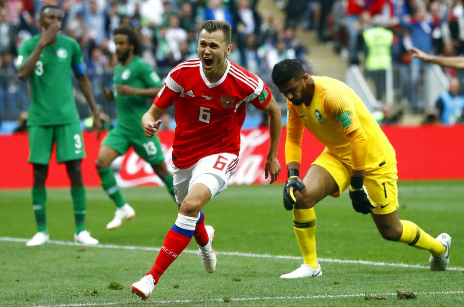The stadium exploded into raptures after only 12 minutes when Yury Gazinsky headed home for the opener. Denis Cheryshev showed great skill of his own to double the hosts’ lead just before half time with a left-footed piledriver. Cheryshev is pictured here celebrating after scoring for his team. AP The stadium exploded into raptures after only 12 minutes when Yury Gazinsky headed home for the opener. Denis Cheryshev showed great skill of his own to double the hosts’ lead just before half time with a left-footed piledriver. Cheryshev is pictured here celebrating after scoring for his team. AP