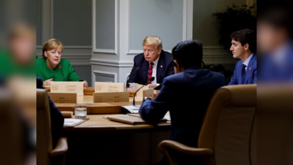 G7 summit ends on bitter note after US backs out of joint communique; awkward photo of Trump-Merkel goes viral