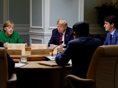 G7 summit ends on bitter note after US backs out of joint communique; awkward photo of Trump-Merkel goes viral G7 summit ends on bitter note after US backs out of joint communique; awkward photo of Trump-Merkel goes viral