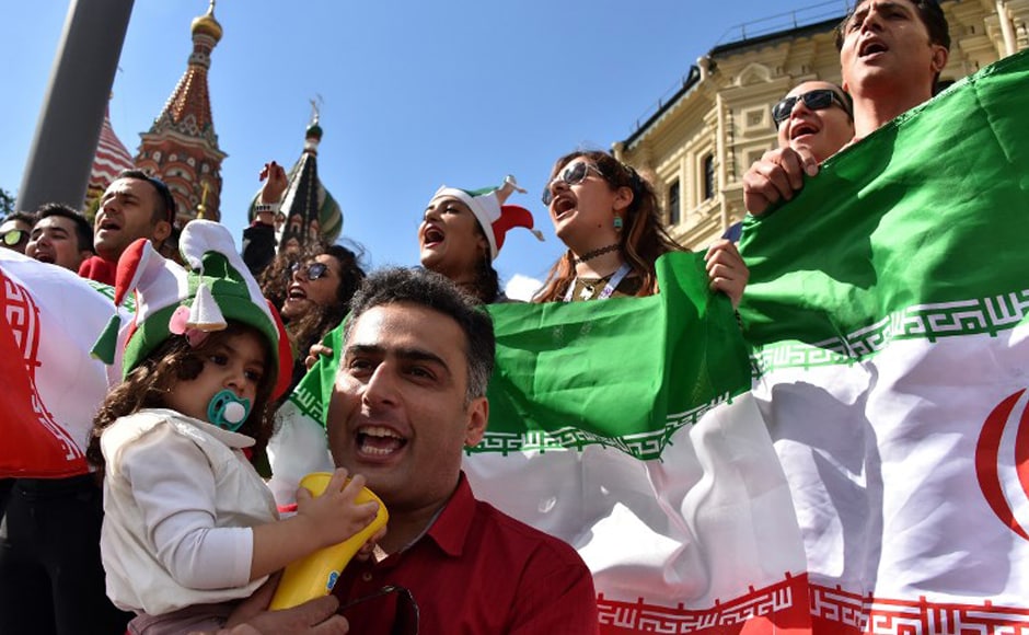 Iran's national football team fans cheer outside the Kremlin in Moscow on 13 June, 2018, ahead of the Russia 2018 World Cup football tournament. AFP. Iran's national football team fans cheer outside the Kremlin in Moscow on 13 June, 2018, ahead of the Russia 2018 World Cup football tournament. AFP.