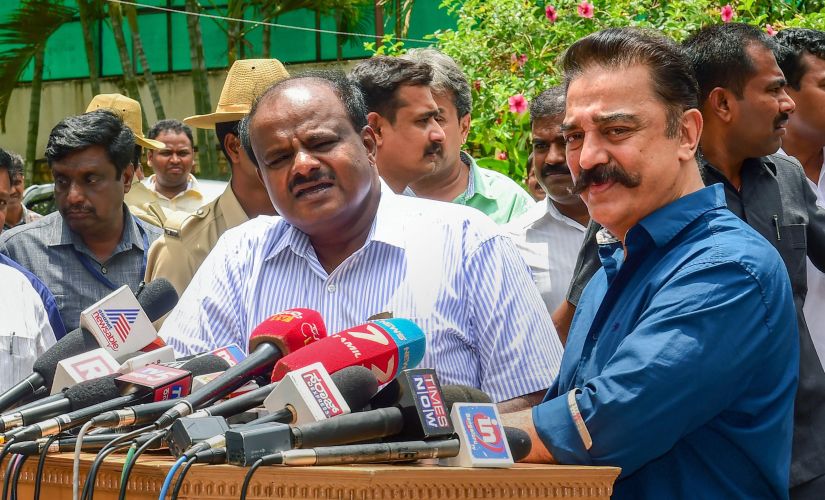 Karnataka Chief Minister HD Kumaraswamy and MNM chief Kamal Hassan address the media after a meeting, in Bengaluru on Monday. PTI