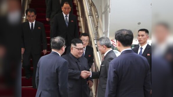 Donald Trump, Kim Jong-un land in Singapore ahead of high-stakes summit which will open with one-on-one meeting