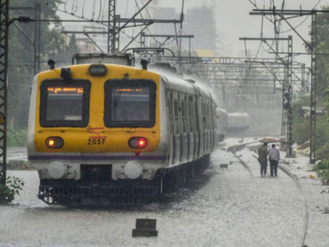 Mumbai Rains Local Train Services Hit Dabbawalas Suspend Work Imd Predicts Heavy To Very Heavy Rain Till Thursday India News Firstpost