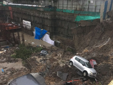Mumbai rains: Wall collapses at Lloyd's Estate in Wadala East; over 15 cars trapped, no injuries reported Mumbai rains: Wall collapses at Lloyd's Estate in Wadala East; over 15 cars trapped, no injuries reported