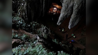 Heavy rains disrupt operations to rescue 12 children trapped in Thailand cave; US military personnel join effort