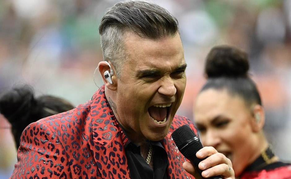English singer Robbie Williams performs during the opening ceremony before the Russia 2018 World Cup Group A football match between Russia and Saudi Arabia at the Luzhniki Stadium in Moscow on 14 June, 2018. AFP English singer Robbie Williams performs during the opening ceremony before the Russia 2018 World Cup Group A football match between Russia and Saudi Arabia at the Luzhniki Stadium in Moscow on 14 June, 2018. AFP