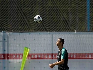 Portugal's Cristiano Ronaldo looks at the ball during the training session of Portugal in Kratovo. AP