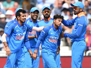 India’s Kuldeep Yadav (2nd R) celebrates with teammates after taking the wicket of England’s Jonny Bairstow during the One Day International (ODI) cricket match between England and India at Trent Bridge in Nottingham central England on July 12, 2018. / AFP PHOTO / Anthony DEVLIN / RESTRICTED TO EDITORIAL USE. NO ASSOCIATION WITH DIRECT COMPETITOR OF SPONSOR, PARTNER, OR SUPPLIER OF THE ECB