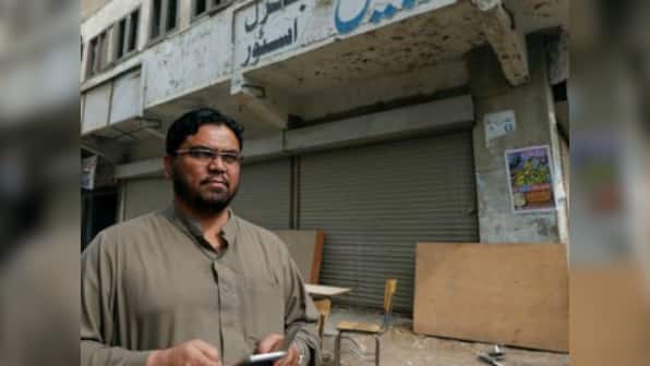 Pakistan's Awami National Party vows to stand against terrorists after Taliban bomber kills 20 activists in Peshawar