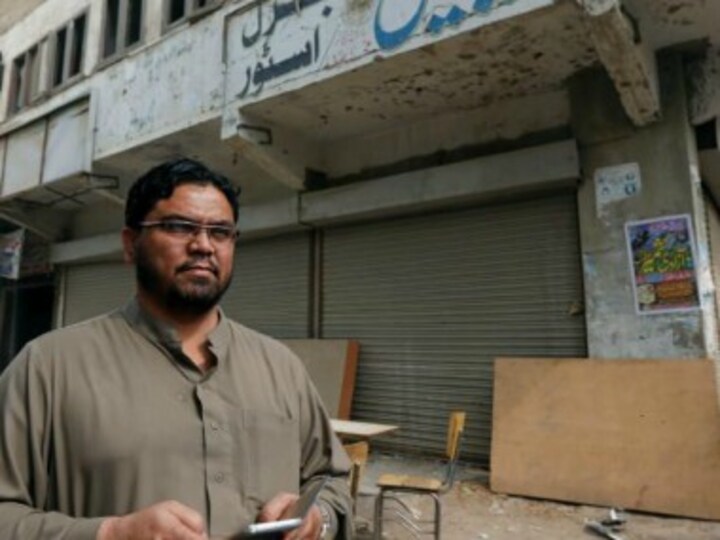 Pakistan's Awami National Party vows to stand against terrorists after Taliban bomber kills 20 activists in Peshawar