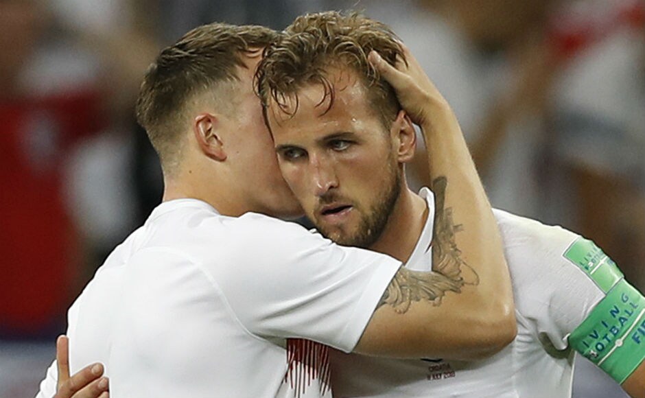 Harry Kane, leader in the Golden Boot race, is consoled by teammate Phil Jones after England's semi-final exit. AP Harry Kane, leader in the Golden Boot race, is consoled by teammate Phil Jones after England's semi-final exit. AP