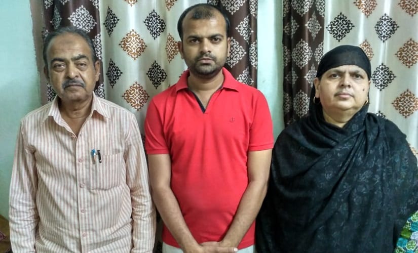 Mohsin's parents with his brother Mubin (centre). Firstpost/Parth MN