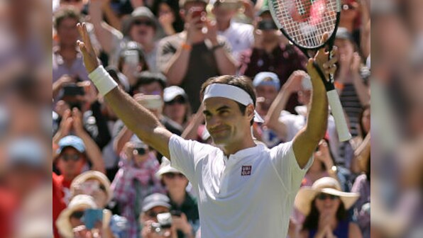 Wimbledon 2018: Defending champion Roger Federer begins campaign with straight-sets victory over Dusan Lajovic