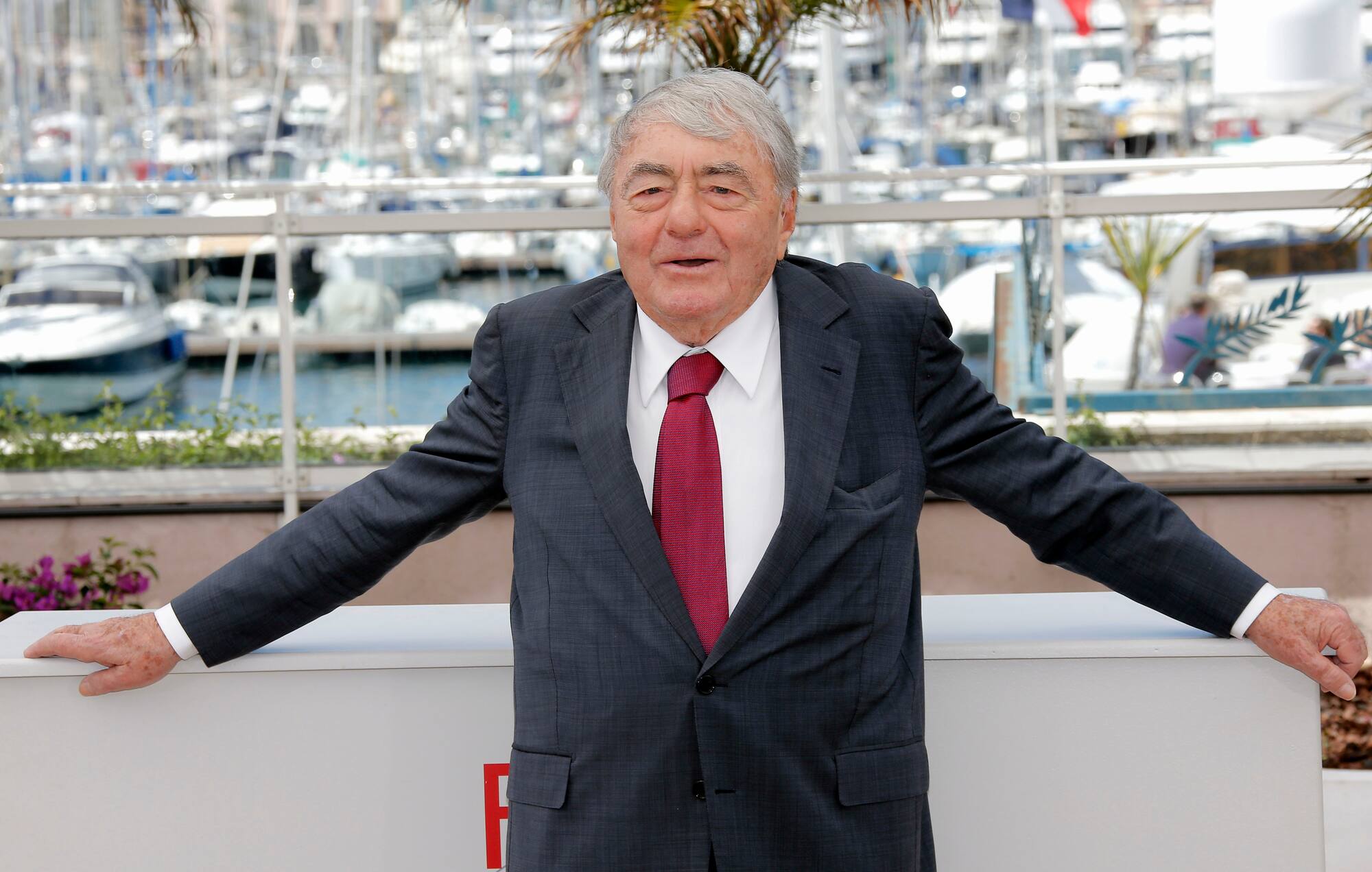 FILE - In this May 19, 2013 French film director Claude Lanzmann poses for photographers during a photo call for the film Le Dernier des Injustes at the 66th international film festival, in Cannes, southern France. Lanzmann, director of the epic movie 'Shoah,' has died at age 92 his publisher said Thursday, July 5, 2018. (AP Photo/Lionel Cironneau, File)