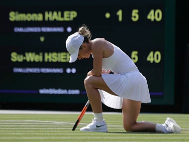 Simona Halep of Romania loses a point to Su-Wei Hsieh of Taiwan during their women's singles match on the sixth day at the Wimbledon Tennis Championships in London, Saturday July 7, 2018. (AP Photo/Ben Curtis)