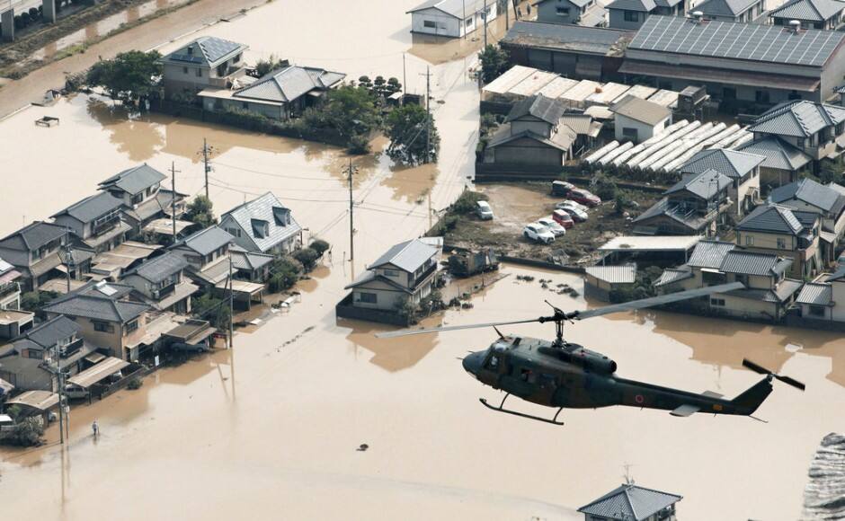 Rescuers were hard at work searching for dozens still missing in southwestern Japan on Monday after heavy rains. AP