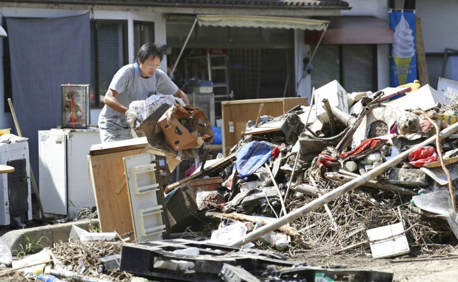 At least 100 people died or are presumed dead, with more than 60 still unaccounted for, most of them in the hardest-hit Hiroshima area. AP