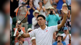 Wimbledon 2018: Kei Nishikori overcomes arm injury to beat Ernests Gulbis and reach quarter-final