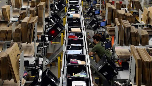 Amazon raises minimum wage to $15 per hour for US workers urging rivals to follow