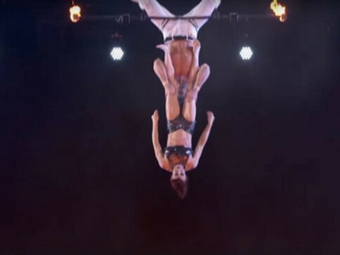 Couple's fiery trapeze act on America's Got Talent goes awfully wrong during judge cuts round Couple's fiery trapeze act on America's Got Talent goes awfully wrong during judge cuts round