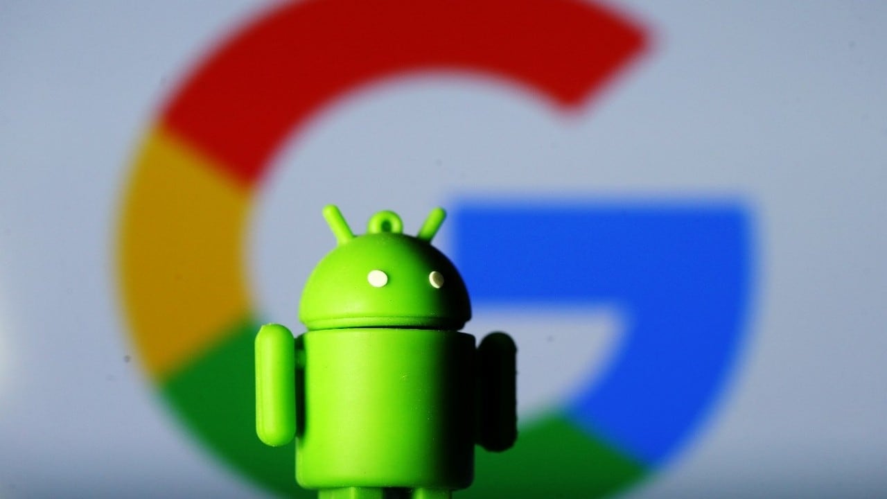 A 3D printed Android mascot Bugdroid is seen in front of a Google logo. Image: Reuters