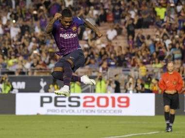 Barcelona midfielder Malcom celebrates his match-winning penalty against Tottenham. AP