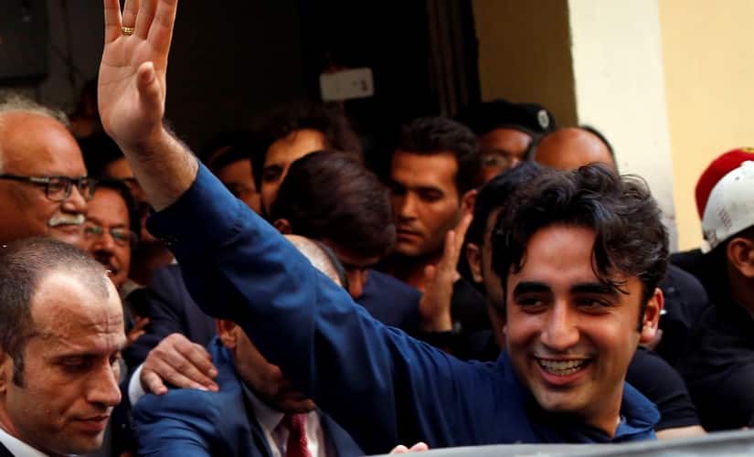 Bilawal Bhutto Zardari waves to supporters after submitting nomination papers for the 2018 general elections in Karachi. Reuters